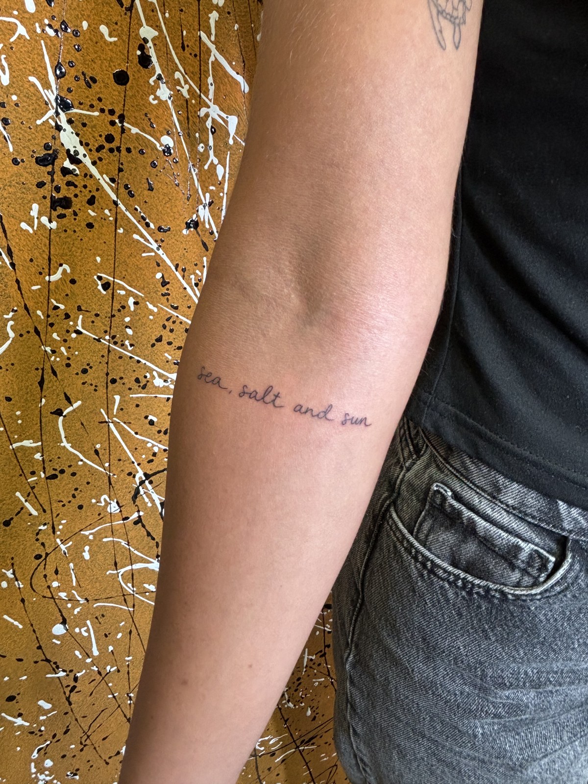 Fine line lettering tattoo: sea, salt and sun
